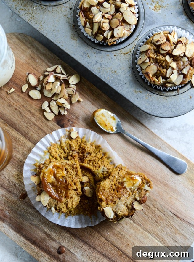 Whole Wheat Pumpkin Almond Muffins I howsweeteats.com