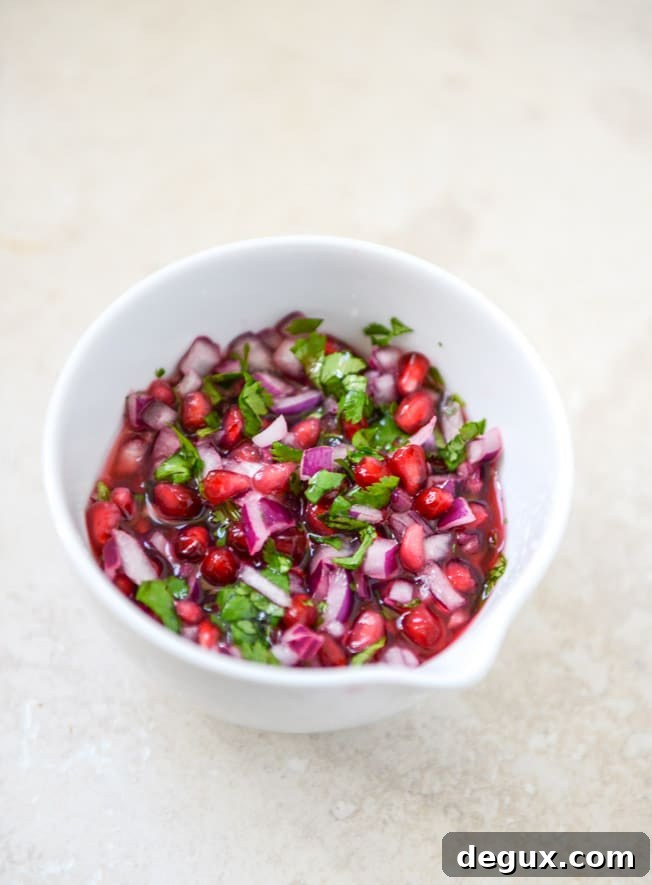 Honey Ginger Chicken Tostadas with Pomegranate Salsa