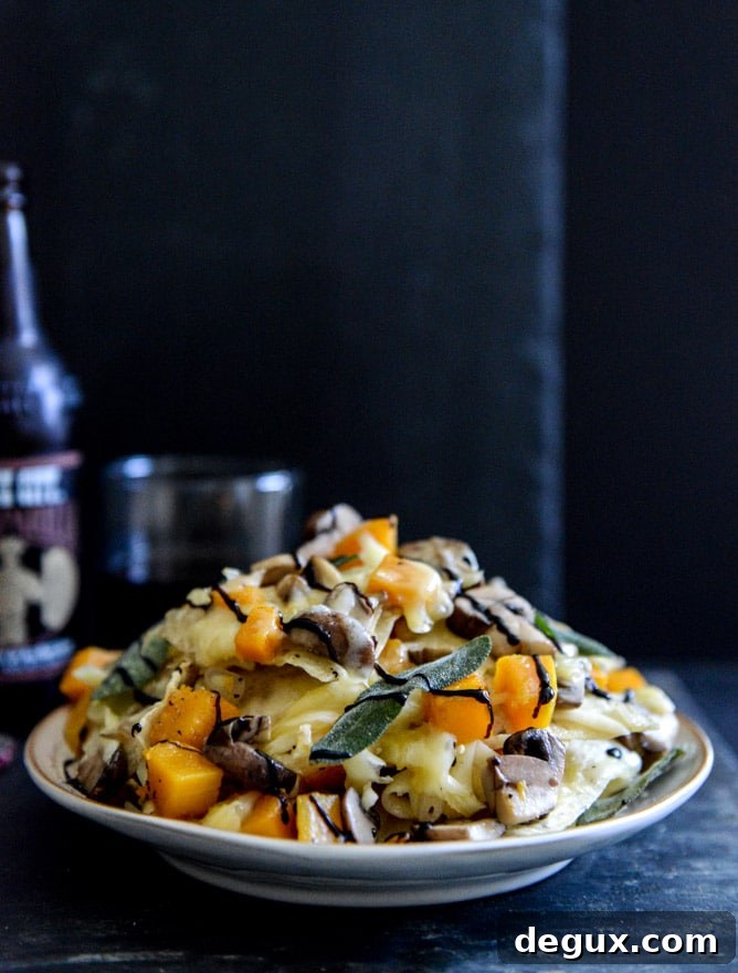 Spiced Butternut Squash, Garlic Butter Mushroom and Fontina Nachos with Crispy Sage I howsweeteats.com