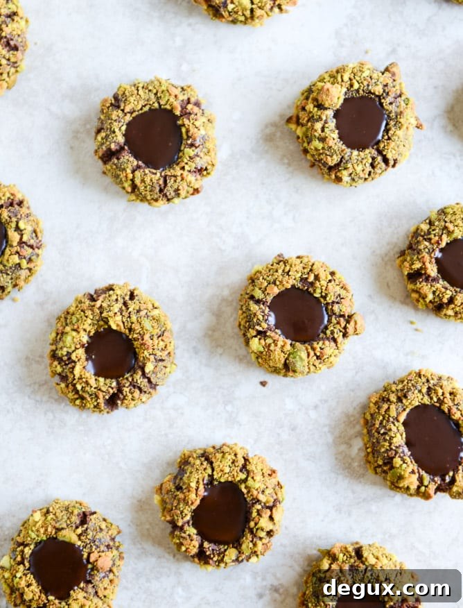 Chocolate Fudge Pistachio Thumbprints I howsweeteats.com