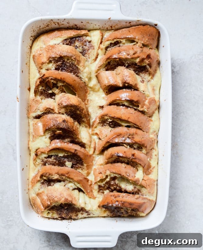 Cinnamon Sugar Sourdough French Toast Bake with Whipped Yogurt Topping I howsweeteats.com Cinnamon Sugar Sourdough French Toast Bake with Whipped Yogurt Topping I howsweeteats.com