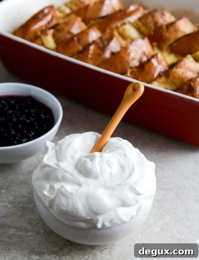 Cinnamon Sugar Sourdough French Toast Bake with Whipped Yogurt Topping I howsweeteats.com Cinnamon Sugar Sourdough French Toast Bake with Whipped Yogurt Topping I howsweeteats.com