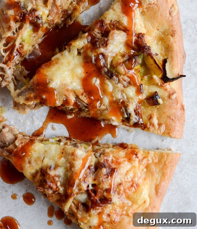 Pulled Pork Pizza with Maple Leeks, Roasted Garlic and Aged Cheddar
