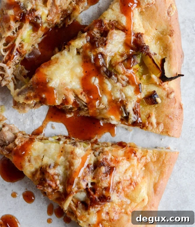 Pulled Pork Pizza with Maple Leeks, Roasted Garlic and Aged Cheddar I howsweeteats.com Pulled Pork Pizza with Maple Leeks, Roasted Garlic and Aged Cheddar I howsweeteats.com