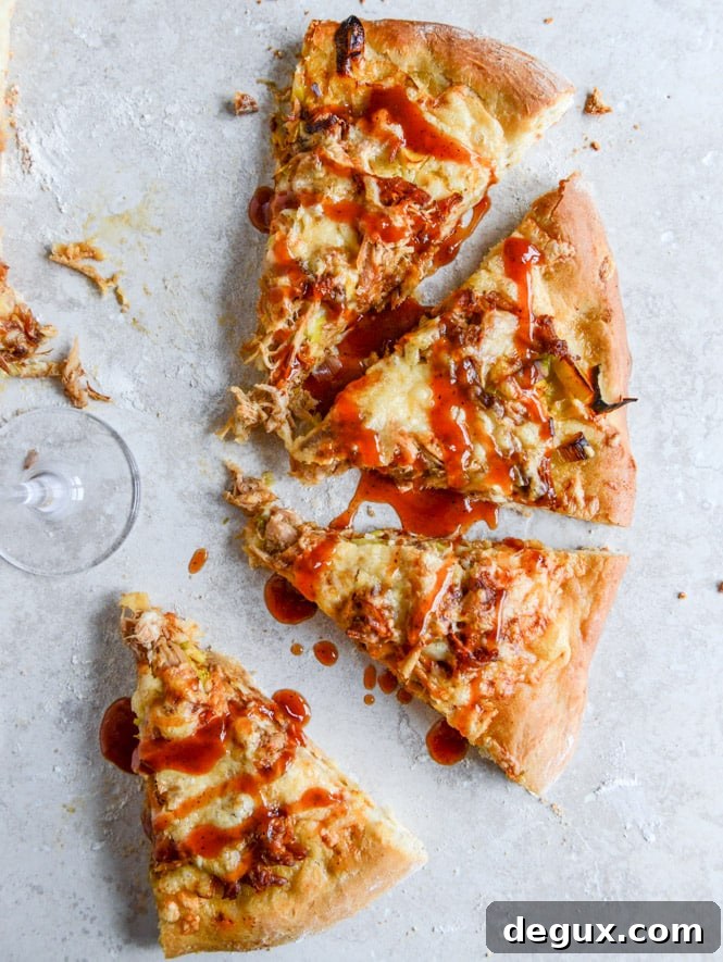 Pulled Pork Pizza with Maple Leeks, Roasted Garlic and Aged Cheddar