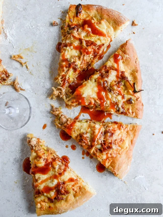 Pulled Pork Pizza with Maple Leeks, Roasted Garlic and Aged Cheddar I howsweeteats.com Pulled Pork Pizza with Maple Leeks, Roasted Garlic and Aged Cheddar I howsweeteats.com