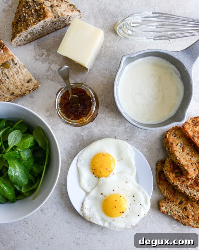 Gruyere, Fig Jam and Arugula Breakfast Sandwiches I howsweeteats.com Gruyere, Fig Jam and Arugula Breakfast Sandwiches I howsweeteats.com