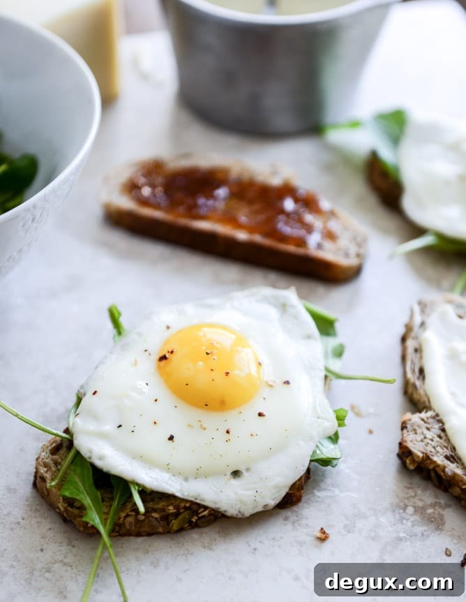 Gruyere, Fig Jam and Arugula Breakfast Sandwiches I howsweeteats.com Gruyere, Fig Jam and Arugula Breakfast Sandwiches I howsweeteats.com