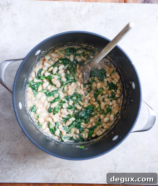 Spicy Greens and Creamy Parmesan Bean Stew I howsweeteats.com Spicy Greens and Creamy Parmesan Bean Stew I howsweeteats.com
