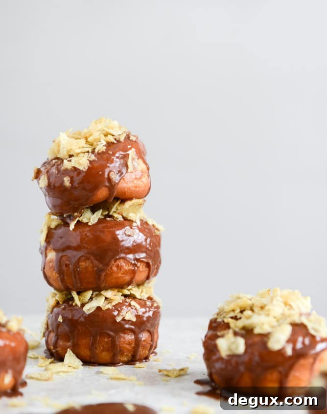 Crunchy Kettle Chip Chocolate Frosted Raised Donuts I howsweeteats.com Crunchy Kettle Chip Chocolate Frosted Raised Donuts I howsweeteats.com