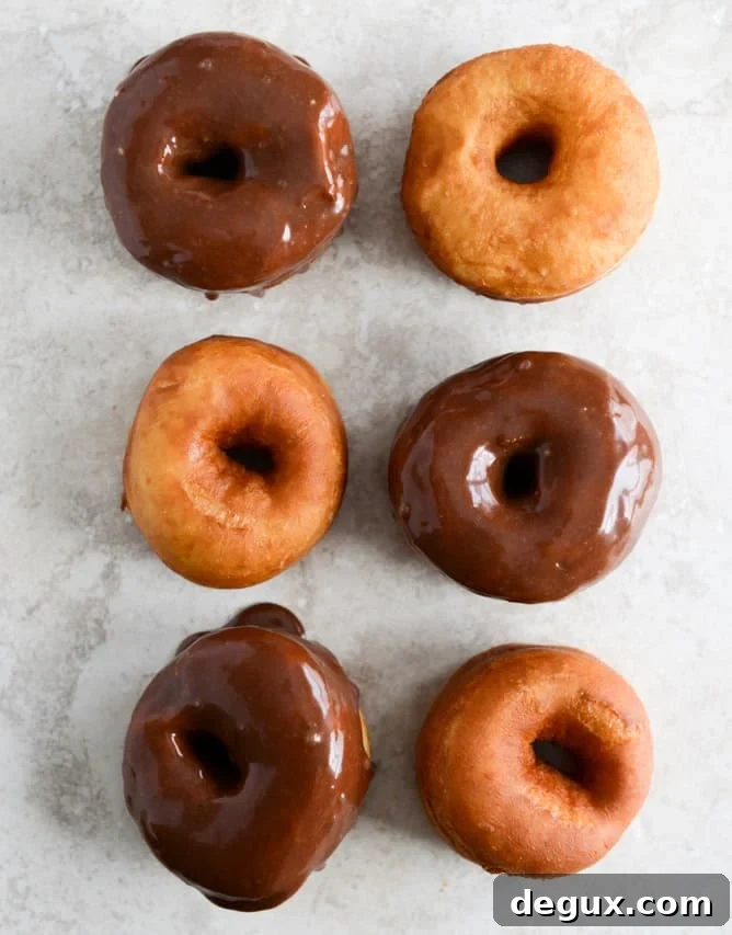 Crunchy Kettle Chip Chocolate Frosted Raised Donuts I howsweeteats.com Crunchy Kettle Chip Chocolate Frosted Raised Donuts I howsweeteats.com