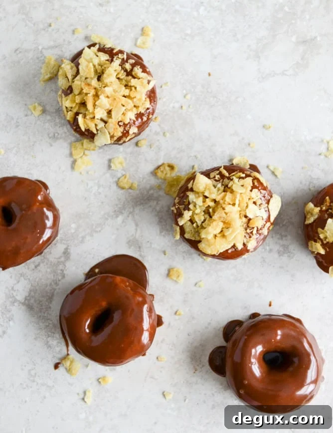 Crunchy Kettle Chip Chocolate Frosted Raised Donuts I howsweeteats.com Crunchy Kettle Chip Chocolate Frosted Raised Donuts I howsweeteats.com