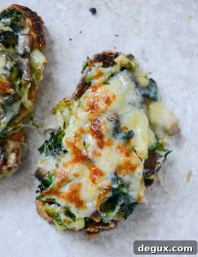 Broiled Fontina Toasts with Roasted Garlic and Poached Eggs Broiled Fontina Toasts with Roasted Garlic and Poached Eggs