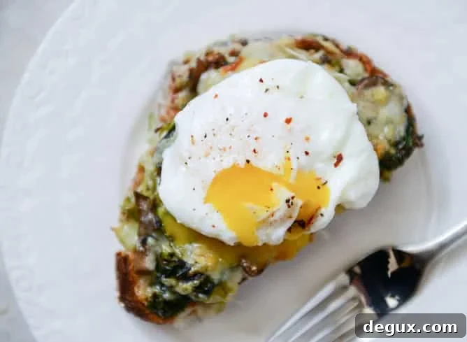 Broiled Fontina Toasts with Roasted Garlic and Poached Eggs Broiled Fontina Toasts with Roasted Garlic and Poached Eggs
