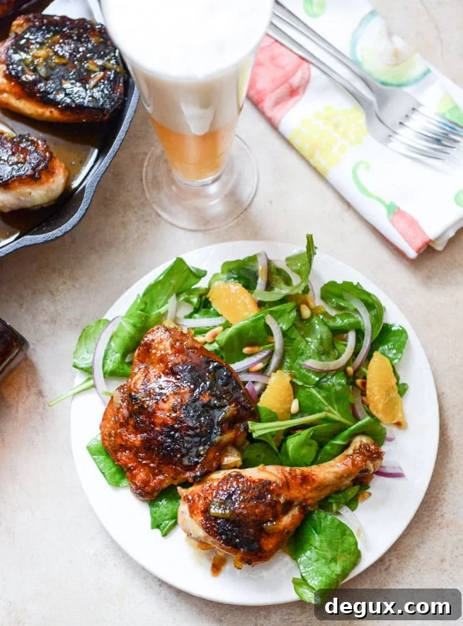 Beer Glazed Citrus Chicken with Orange Arugula Greens I howsweeteats.com Beer Glazed Citrus Chicken with Orange Arugula Greens I howsweeteats.com