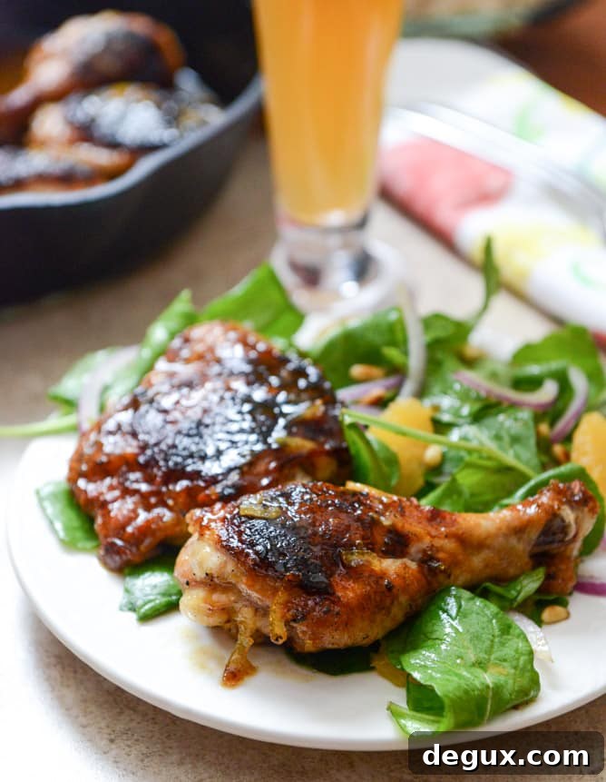 Beer Glazed Citrus Chicken with Orange Arugula Greens I howsweeteats.com Beer Glazed Citrus Chicken with Orange Arugula Greens I howsweeteats.com