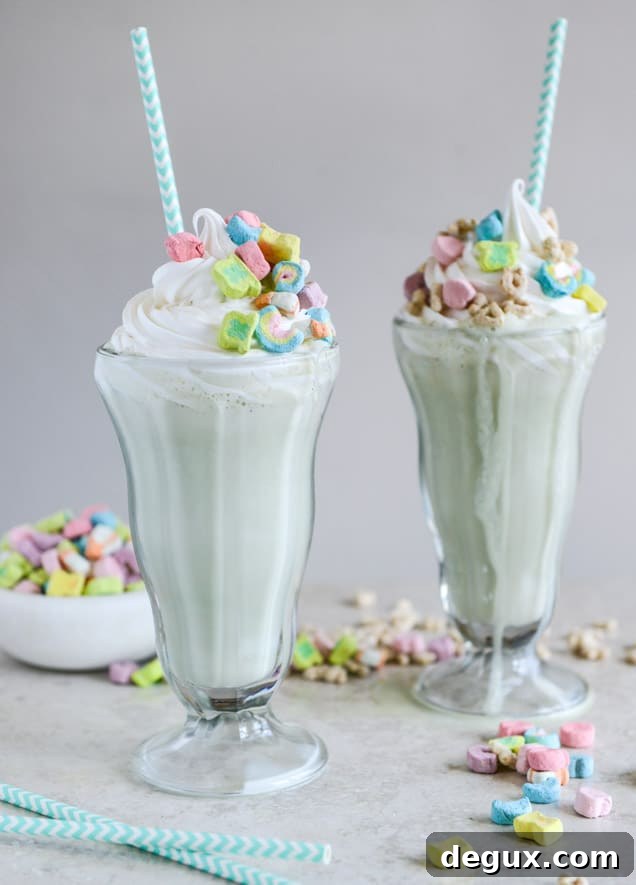 Boozy Lucky Charms Cereal Milkshakes with Marshmallow Frosting