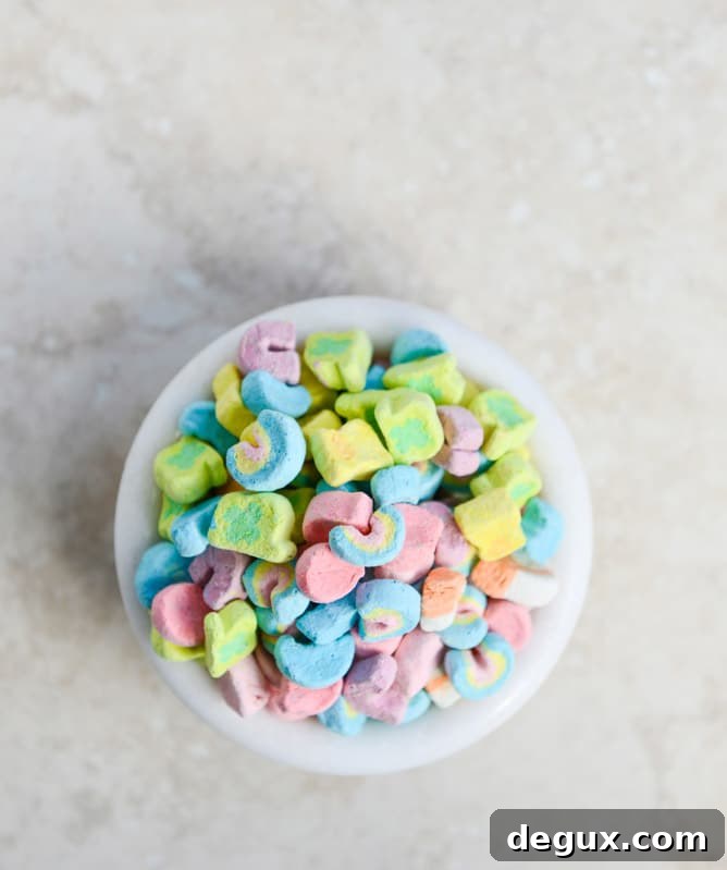 Boozy Lucky Charms Cereal Milkshakes with Marshmallow Frosting