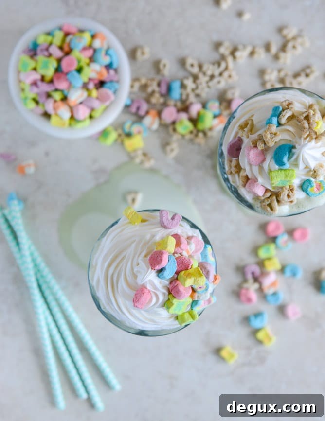 Boozy Lucky Charms Cereal Milkshakes with Marshmallow Frosting