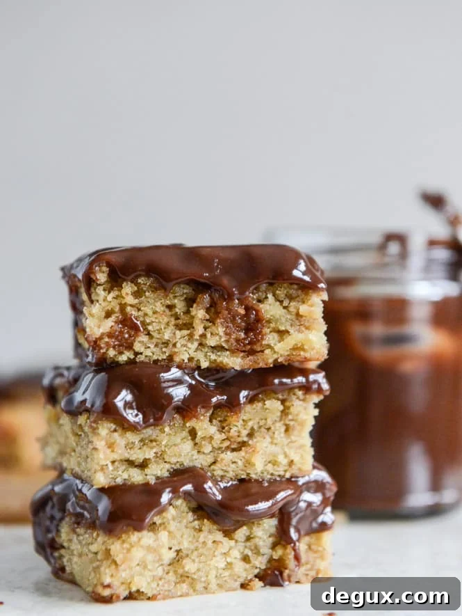 Banana Blondies with Chocolate Peanut Butter Ganache I howsweeteats.com