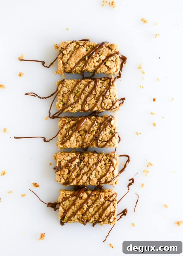 Chewy Pistachio Macaroon Granola Bars Recipe for Snack Lovers 5 chewy pistachio maracoon granola bars I howsweeteats.com