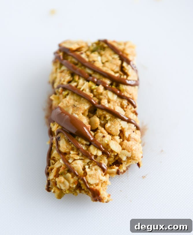 Chewy Pistachio Macaroon Granola Bars Recipe for Snack Lovers 7 chewy pistachio maracoon granola bars I howsweeteats.com