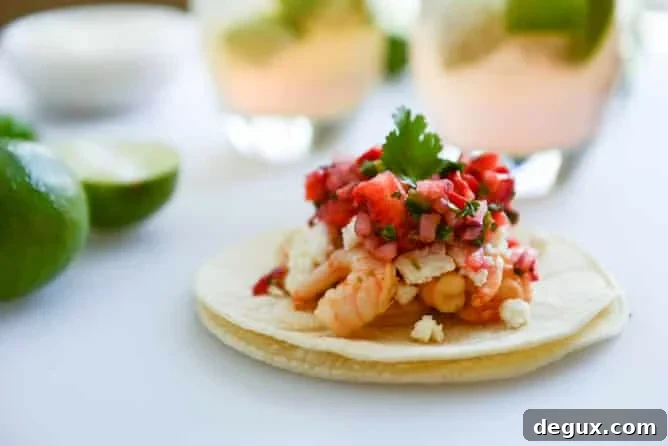 Chipotle Lime Shrimp Tacos with Strawberry Salsa I howsweeteats.com