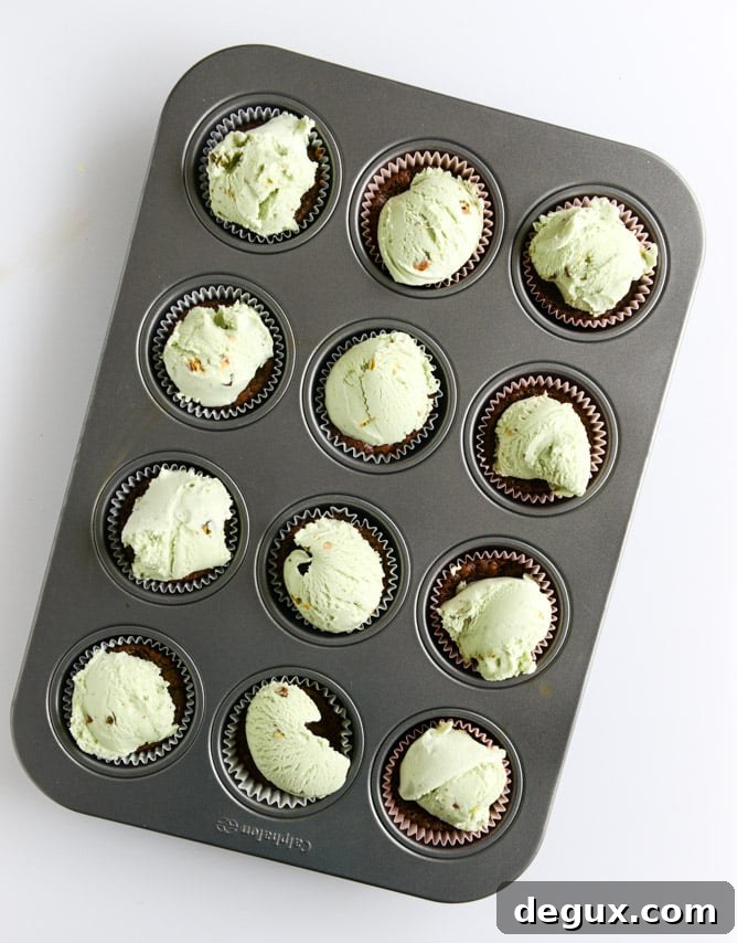 Pistachio Hot Fudge Cupcakes Recipe: Decadent Chocolate Pistachio Cupcakes 3 pistachio ice cream hot fudge cupcakes I howsweeteats.com