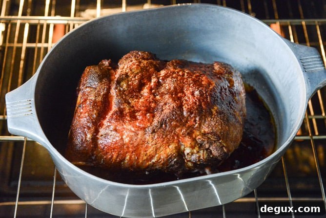Juicy Pulled Pork Sandwich Recipe with Tangy BBQ Sauce 4 saucy pulled pork sandwiches I howsweeteats.com