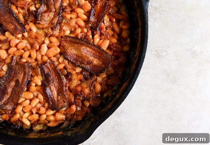 Skillet Baked White Beans. (on toast!) I howsweeteats.com