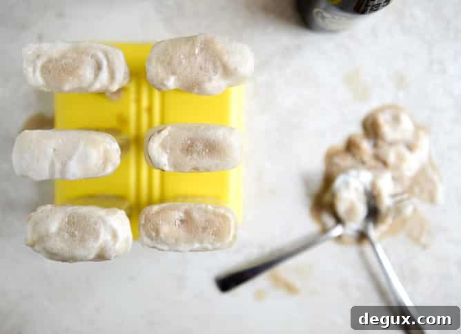 Root Beer Float Popsicles: Creamy Homemade Summer Treats 3 root beer floatsicles I howsweeteats.com