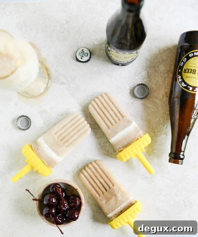 Root Beer Float Popsicles: Creamy Homemade Summer Treats 5 root beer floatsicles I howsweeteats.com
