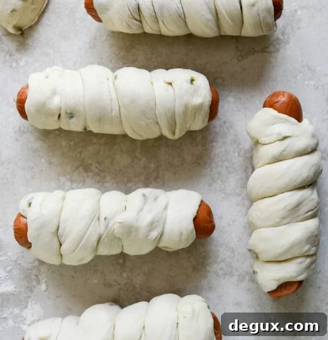 Jalapeño Pretzel Dogs with Cheddar Beer Sauce