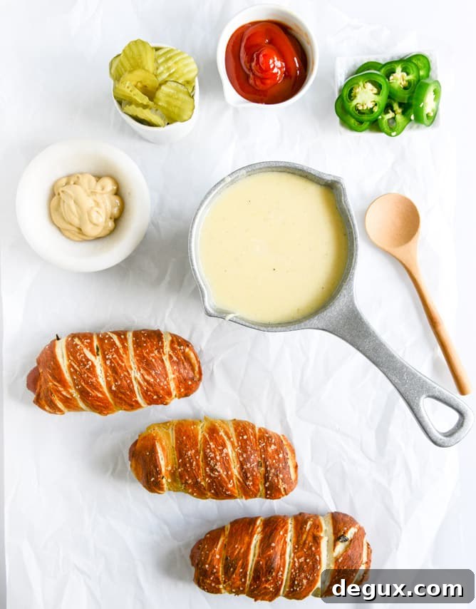 Jalapeño Pretzel Dogs with Cheddar Beer Sauce