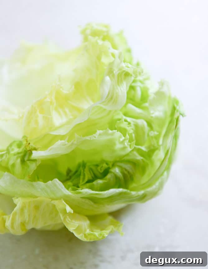 Lamb Slider Lettuce Wraps with Whipped Feta Spread Recipe 3 lamb slider lettuce wraps with whipped feta, artichokes and sun dried tomatoes I howsweeteats.com