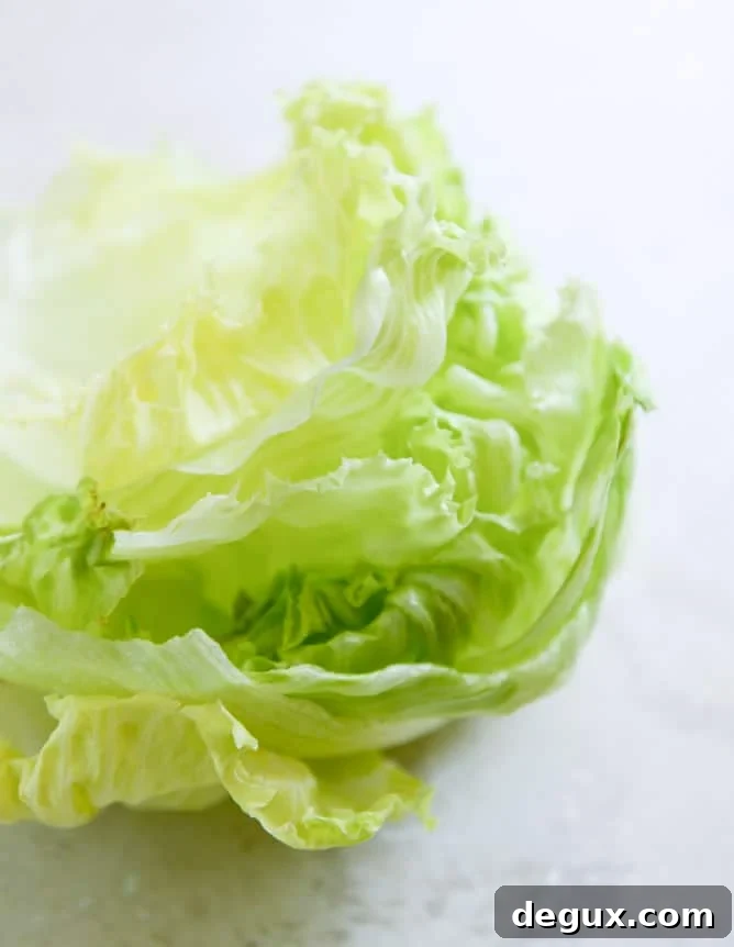Lamb Slider Lettuce Wraps with Whipped Feta Spread Recipe 3 lamb slider lettuce wraps with whipped feta, artichokes and sun dried tomatoes I howsweeteats.com