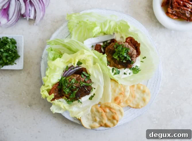 Lamb Slider Lettuce Wraps with Whipped Feta Spread Recipe 5 lamb slider lettuce wraps with whipped feta, artichokes and sun dried tomatoes I howsweeteats.com