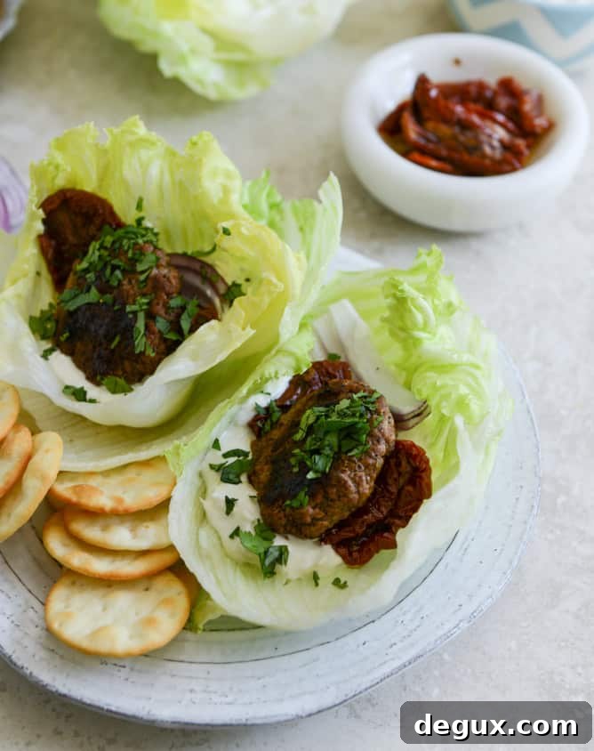 Lamb Slider Lettuce Wraps with Whipped Feta Spread Recipe 7 lamb slider lettuce wraps with whipped feta, artichokes and sun dried tomatoes I howsweeteats.com