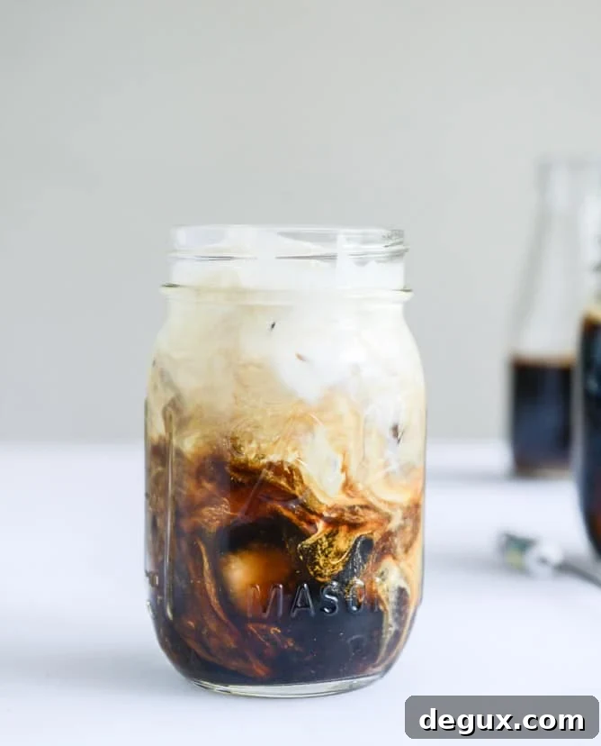 my favorite cold brew coffee with homemade vanilla bean, blackberry, almond and cinnamon-brown sugar syrups I howsweeteats.com