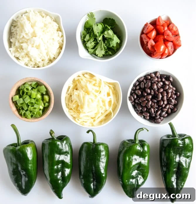 cheese smothered stuffed poblanos I howsweeteats.com