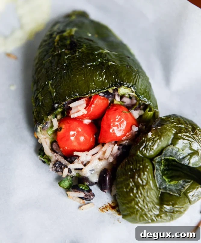 cheese smothered stuffed poblanos I howsweeteats.com