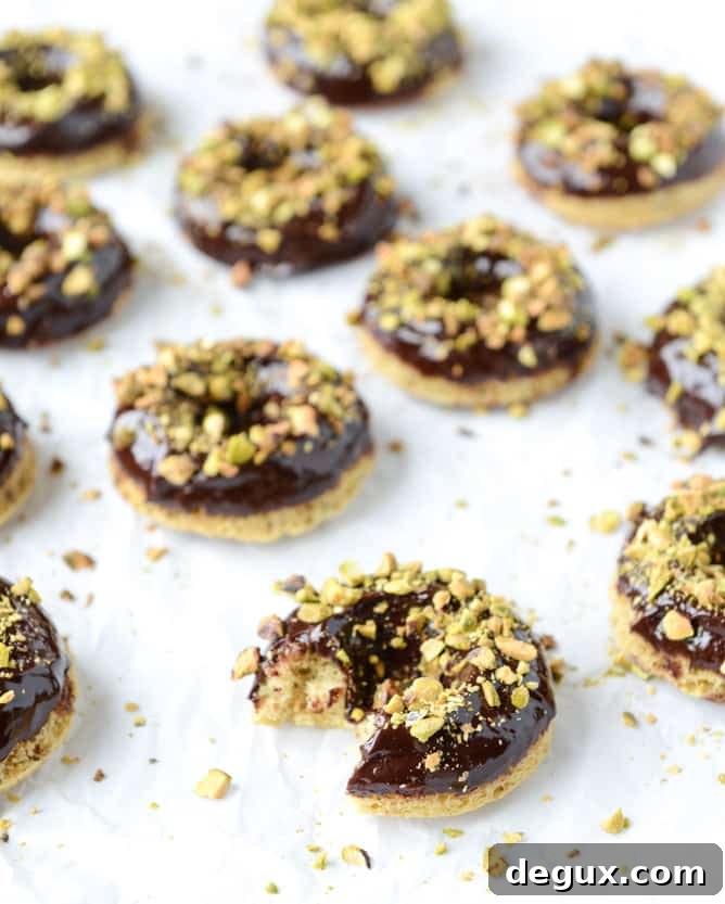 chocolate fudge pistachio cake donuts I howsweeteats.com