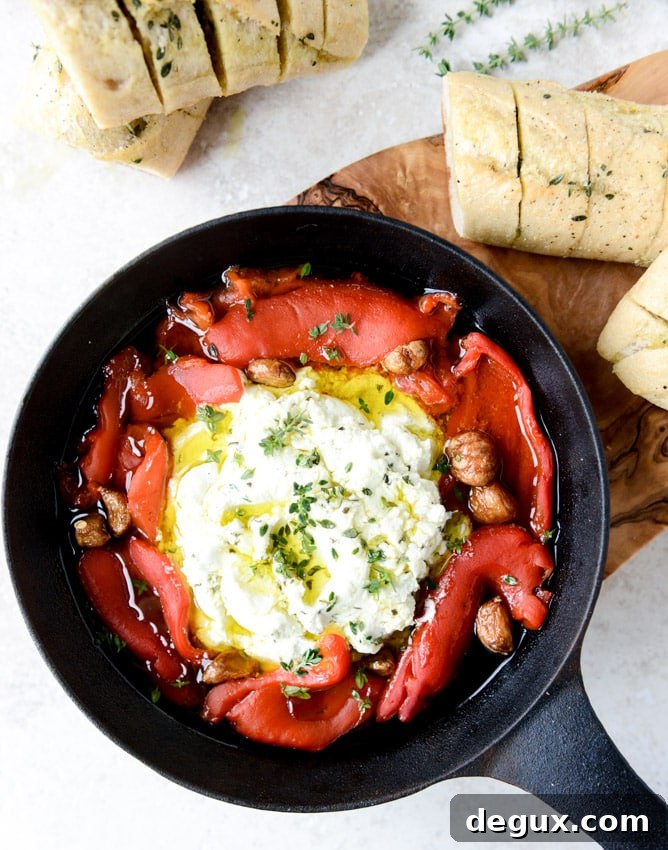 baked goat cheese with roasted garlic and pull-apart baguettes I howsweeteats.com
