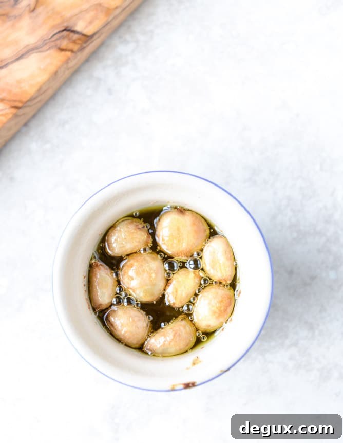 baked goat cheese with roasted garlic and pull-apart baguettes I howsweeteats.com