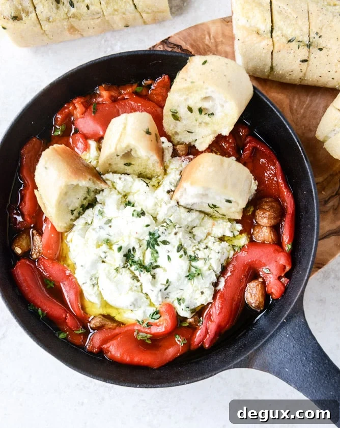 baked goat cheese with roasted garlic and pull-apart baguettes I howsweeteats.com