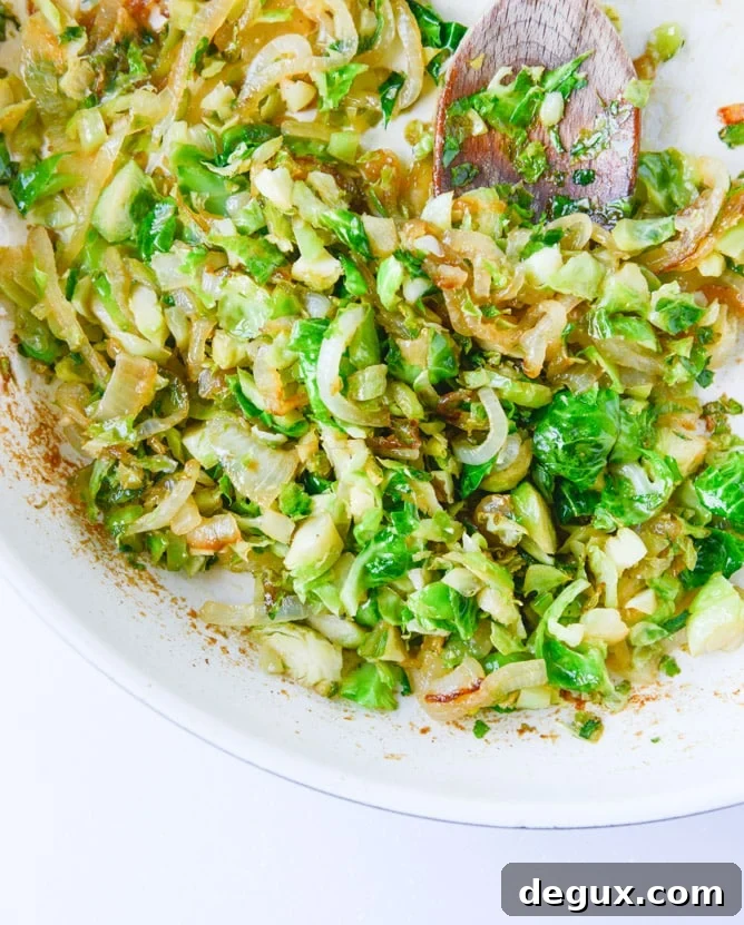 Crispy Shredded Brussels Sprouts, Cider Short Rib & Caramelized Shallot Pizza 4 crispy shredded sprouts, short rib and caramelized shallot pizza I howsweeteats.com