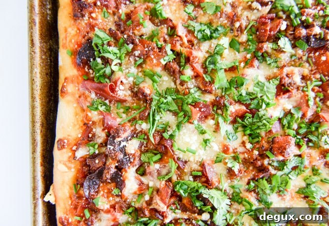 Ultimate Meat Lovers Pizza Recipe: Loaded Pepperoni & Sausage Pie 5 meat lovers pizza I howsweeteats.com