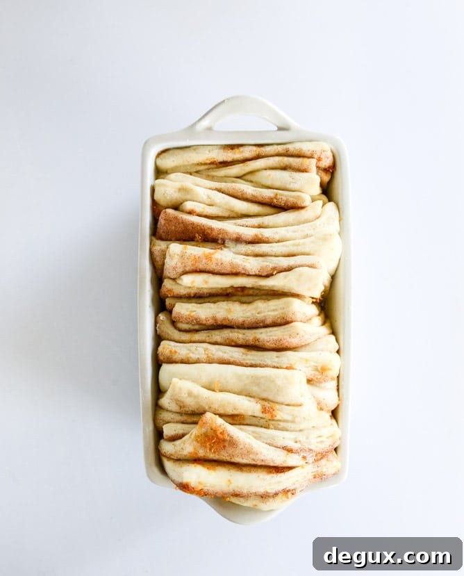 Sweet Orange Cinnamon Pull-Apart Bread (Video Tutorial) 4 sweet orange cinnamon pull apart bread I howsweeteats.com