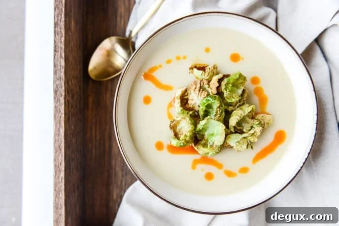 creamy roasted garlic potato soup with crispy brussels I howsweeteats.com