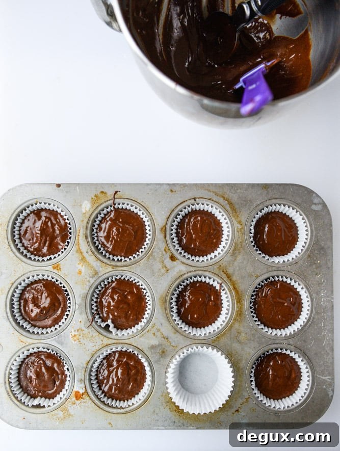 Chocolate Coconut Cream Cupcakes Recipe for Decadent Dessert 4 chocolate coconut cream cupcakes I howsweeteats.com